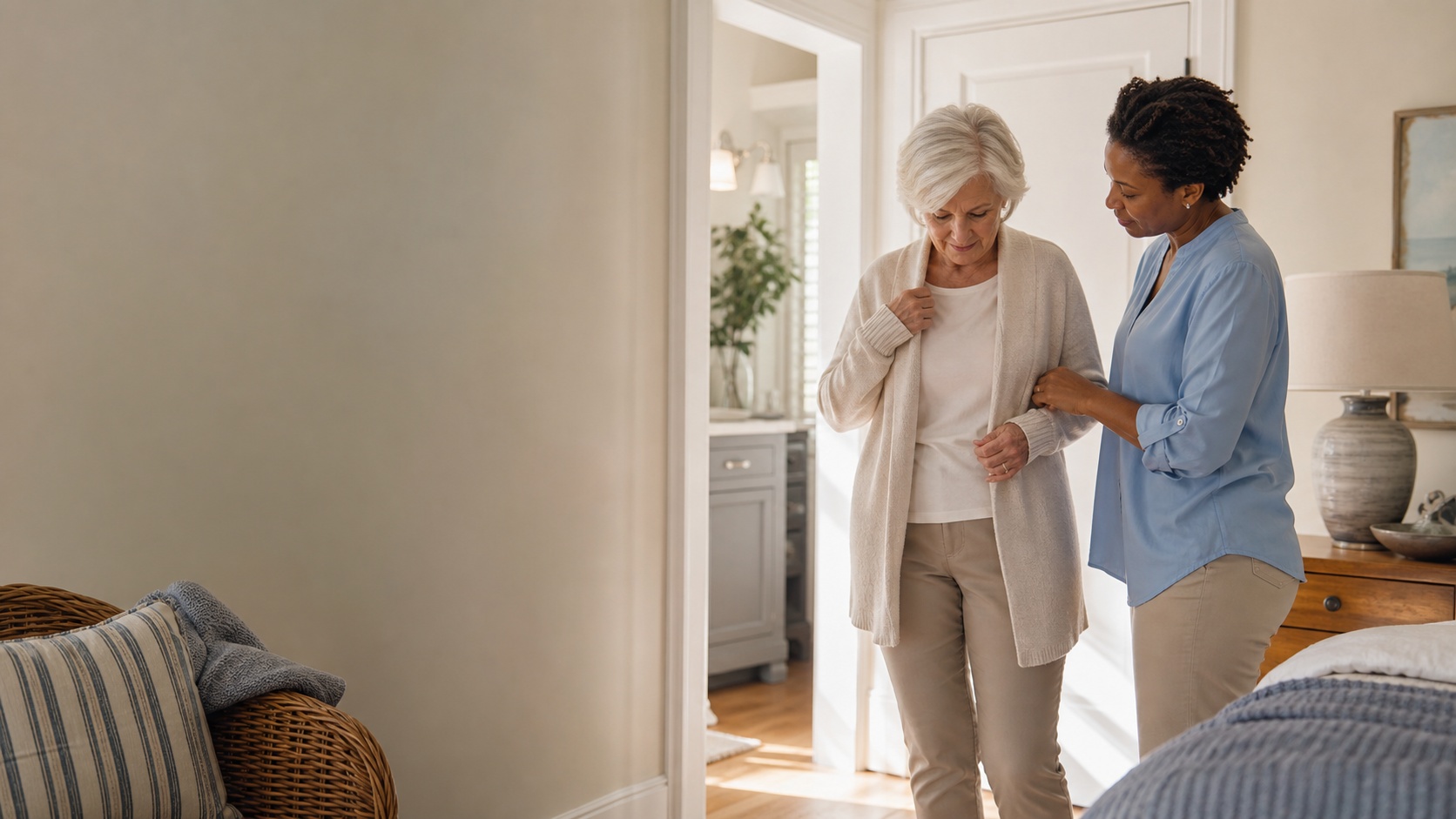 Caregiver helping an older adult with a safe daily routine in a Charleston home